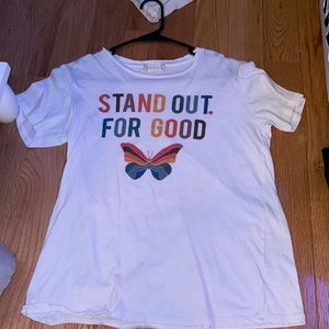 a medium, oversized tshirt that is white and fairly new